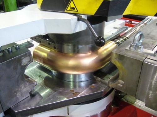 Rotary draw bending 90-10 copper nickel pipe using a mandrel. Photo courtesy of Eucaro Buntmetall GmbH.